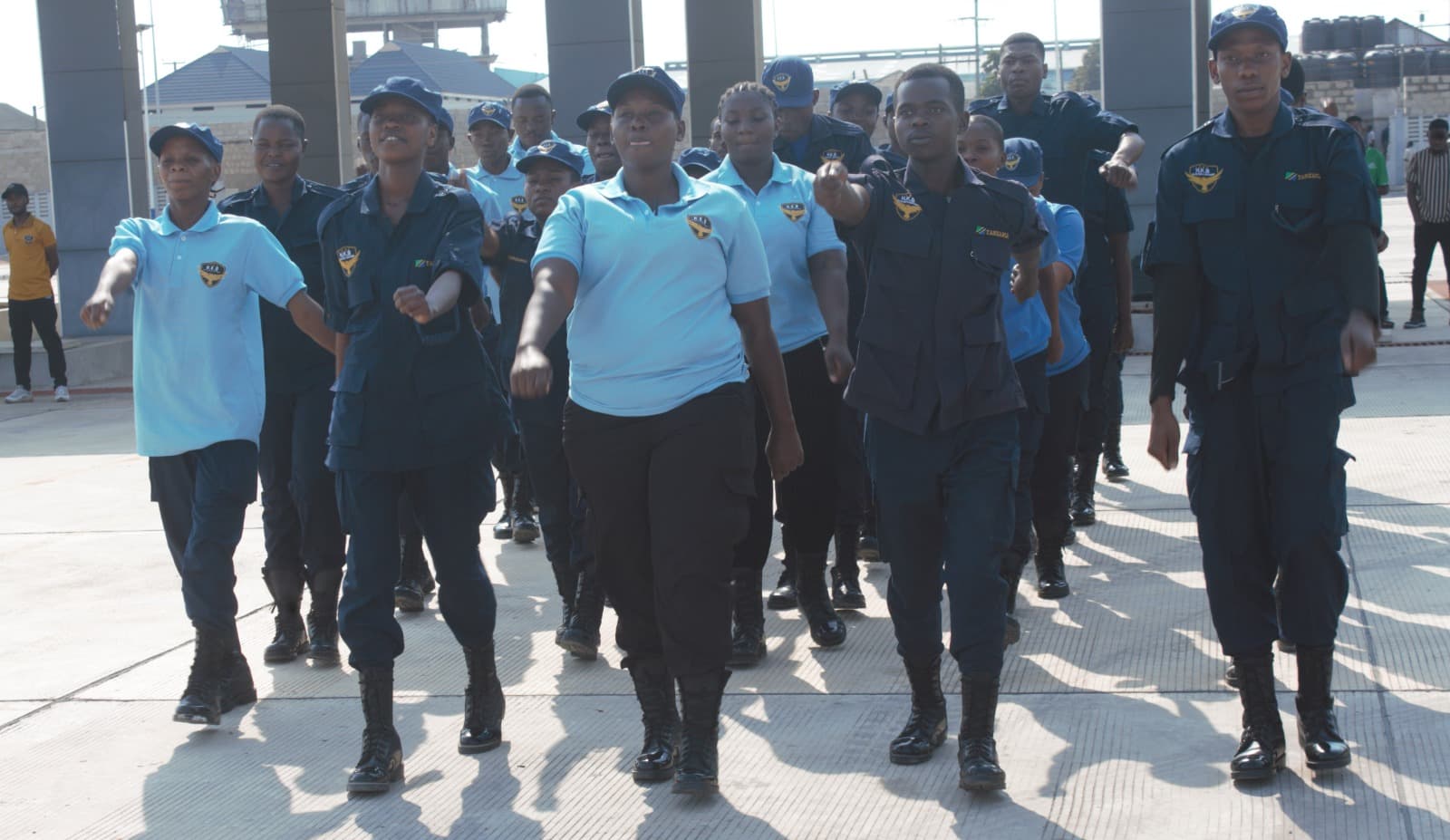 HKB officers parading in front of DART BRT buses
