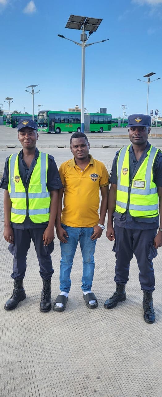 Two HKB officers in hi-vis vests at the BRT depot