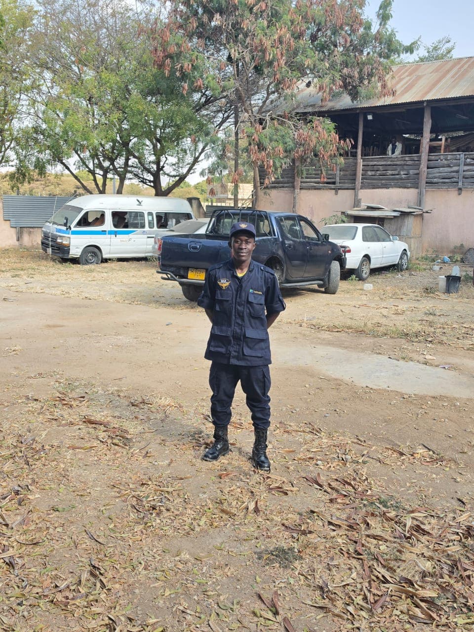 HKB security officer on station guarding a vehicle garage