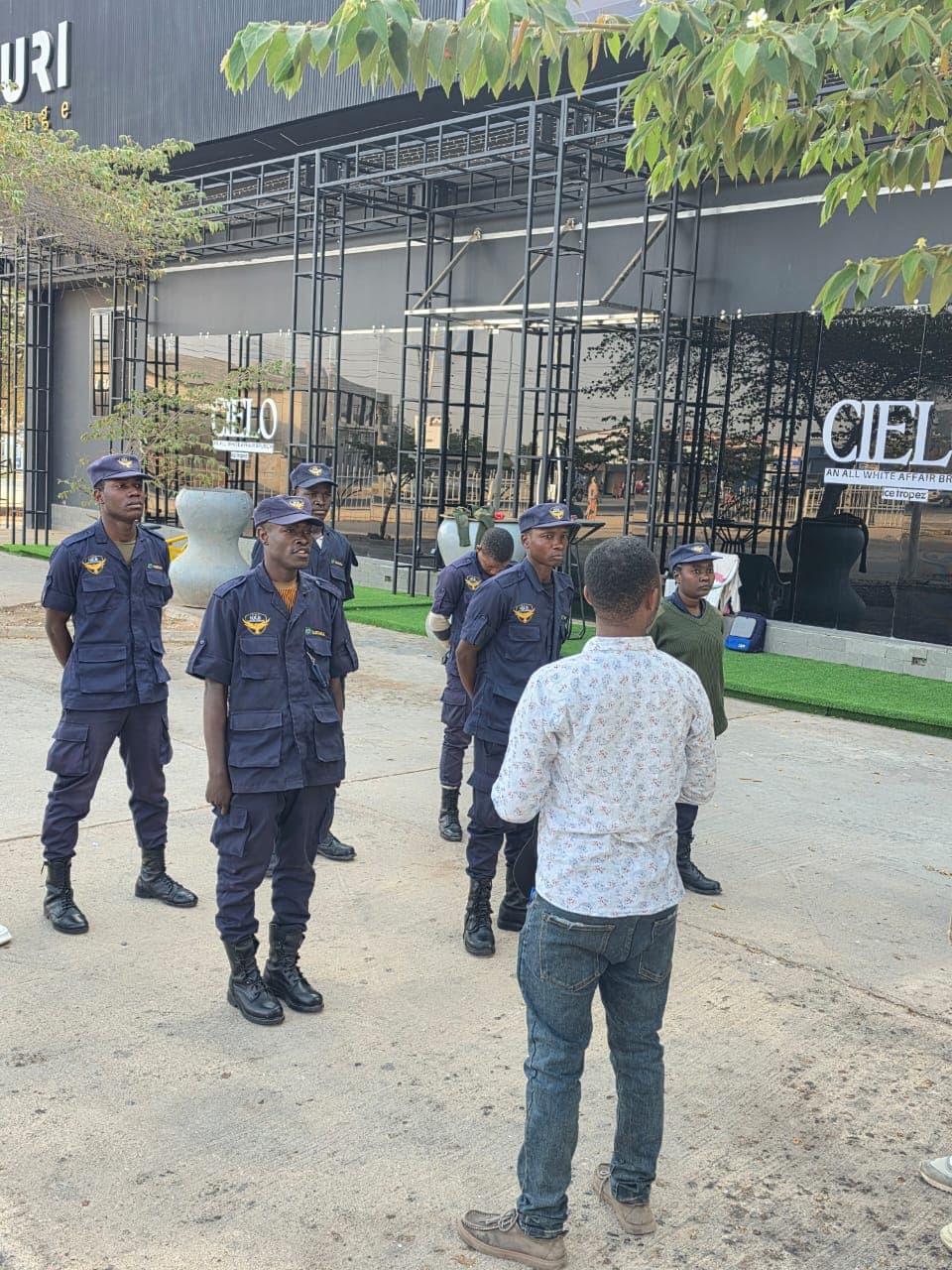 HKB officers on guard outside the ZURI building